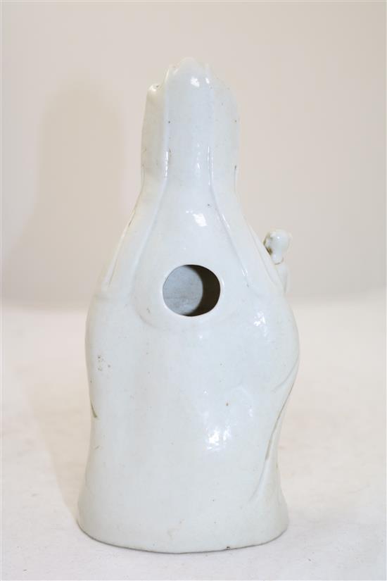 Chinese white glazed porcelain figure of Guanyin holding a child, Jiaqing period, 21cm, childs head re-stuck(-)
